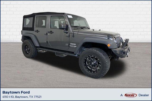 used 2018 Jeep Wrangler JK Unlimited car, priced at $23,996