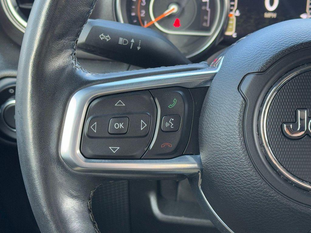 used 2021 Jeep Wrangler Unlimited car, priced at $28,827