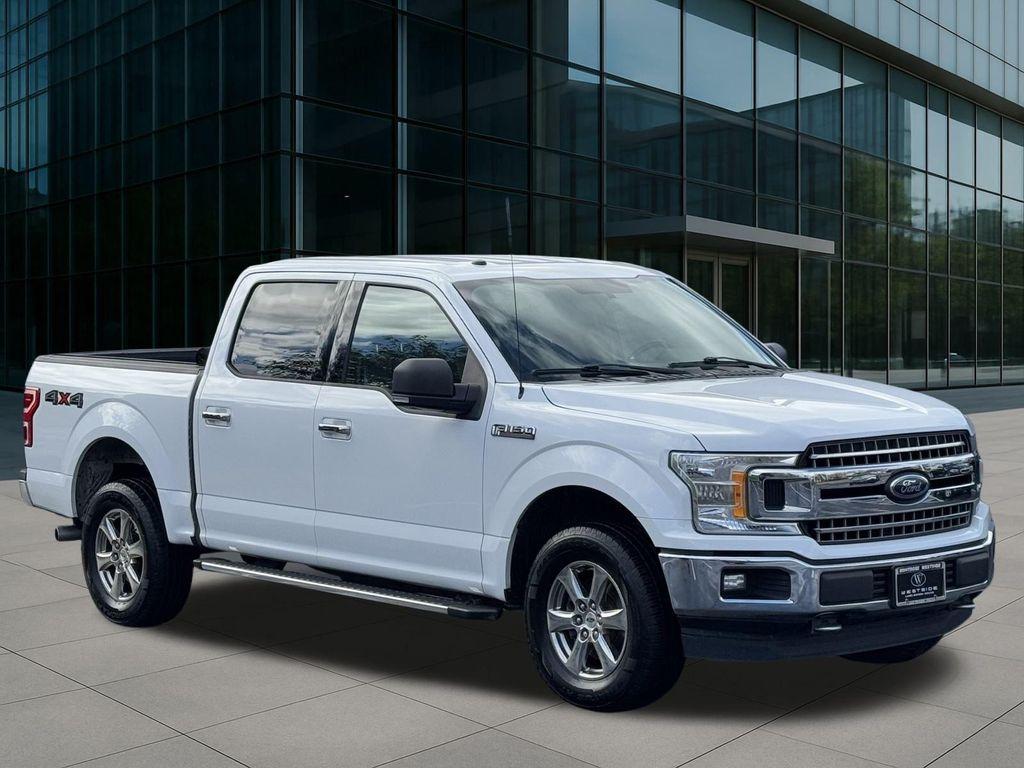 used 2018 Ford F-150 car, priced at $17,518