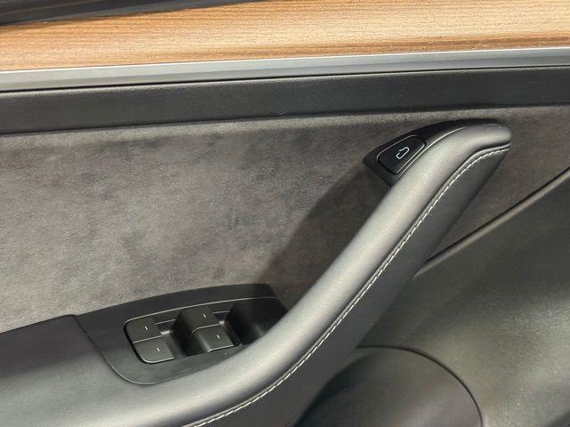 used 2023 Tesla Model 3 car, priced at $31,499