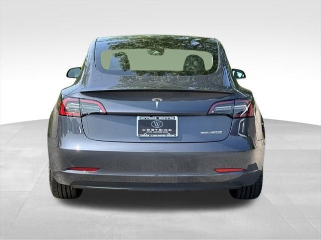 used 2023 Tesla Model 3 car, priced at $31,499