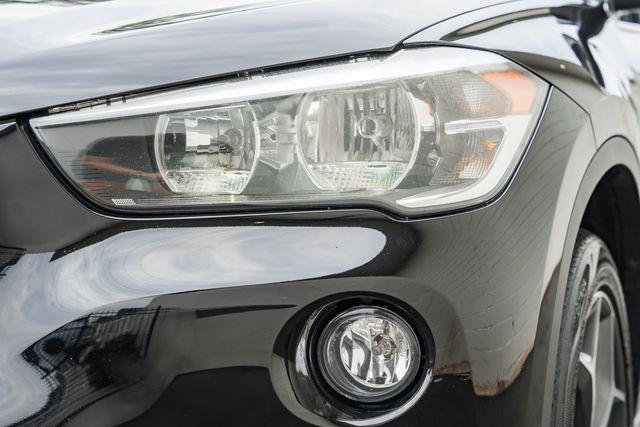 used 2018 BMW X1 car, priced at $17,500