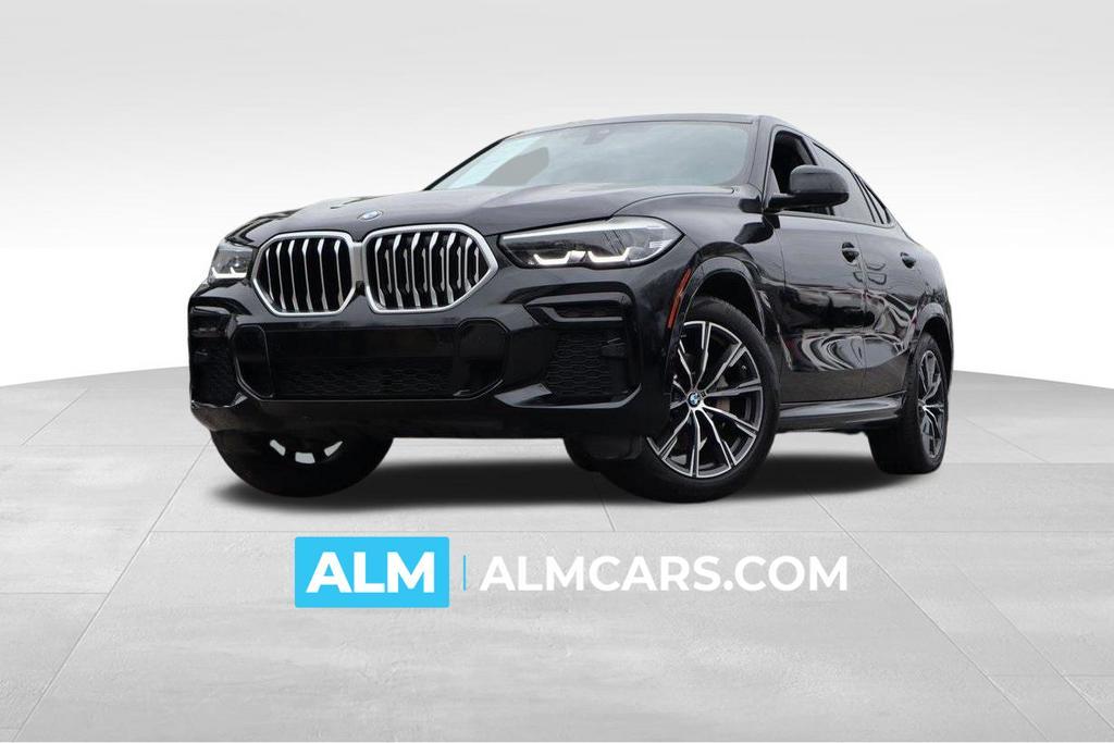 used 2023 BMW X6 car, priced at $55,420