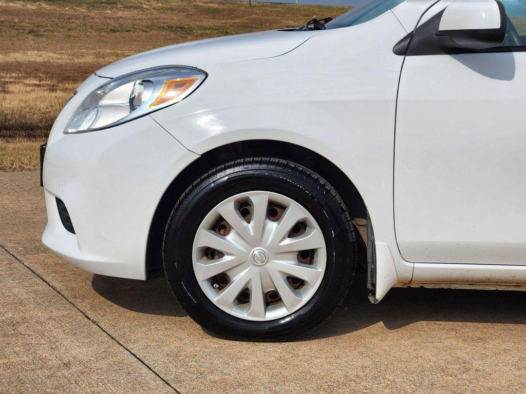 used 2012 Nissan Versa car, priced at $4,299