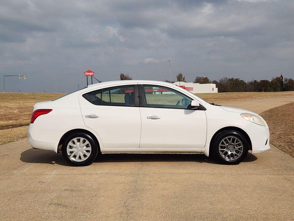 used 2012 Nissan Versa car, priced at $4,299