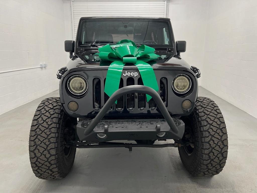 used 2016 Jeep Wrangler Unlimited car, priced at $13,991