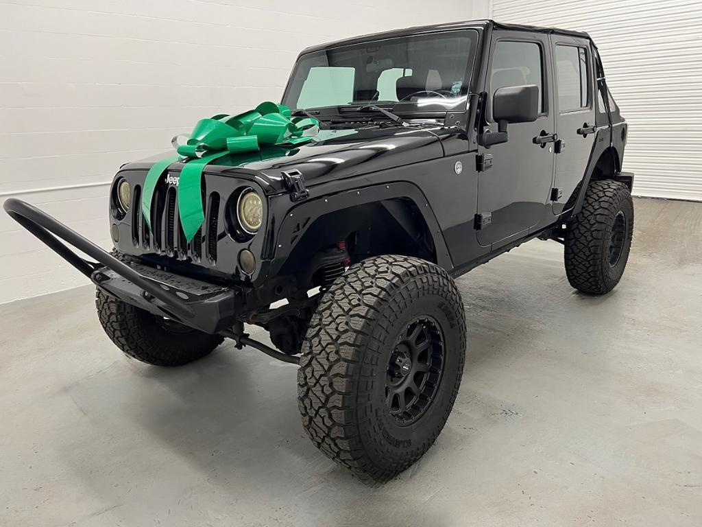 used 2016 Jeep Wrangler Unlimited car, priced at $13,991