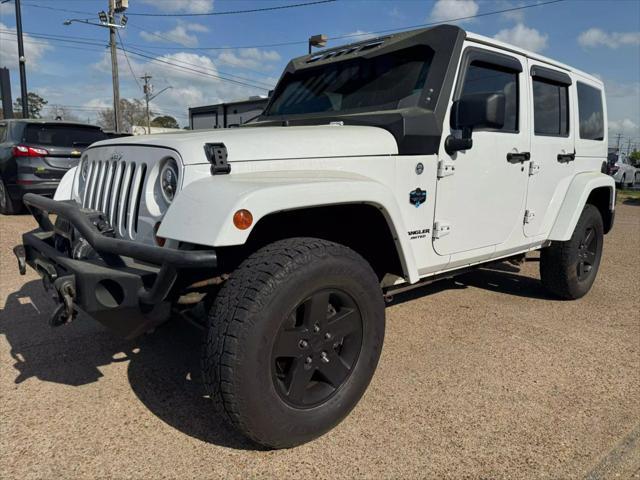 used 2012 Jeep Wrangler Unlimited car, priced at $18,874