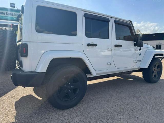 used 2012 Jeep Wrangler Unlimited car, priced at $18,874