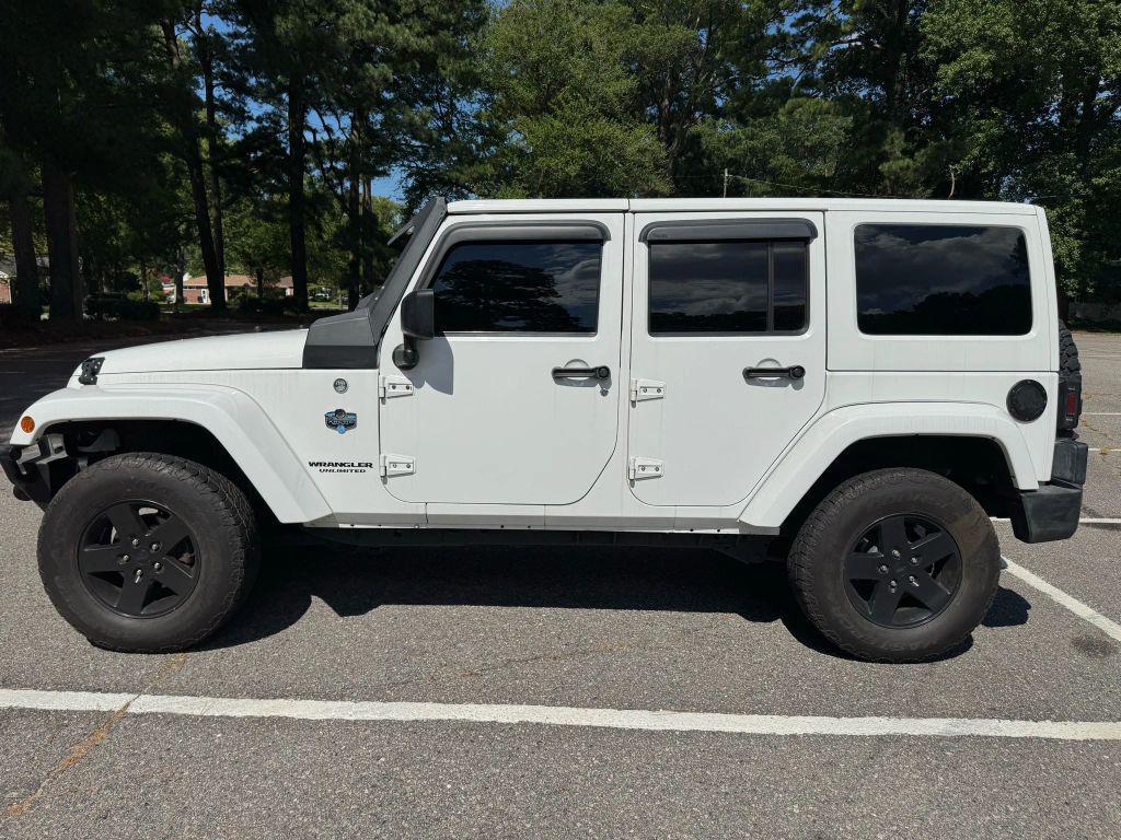 used 2012 Jeep Wrangler Unlimited car, priced at $15,600