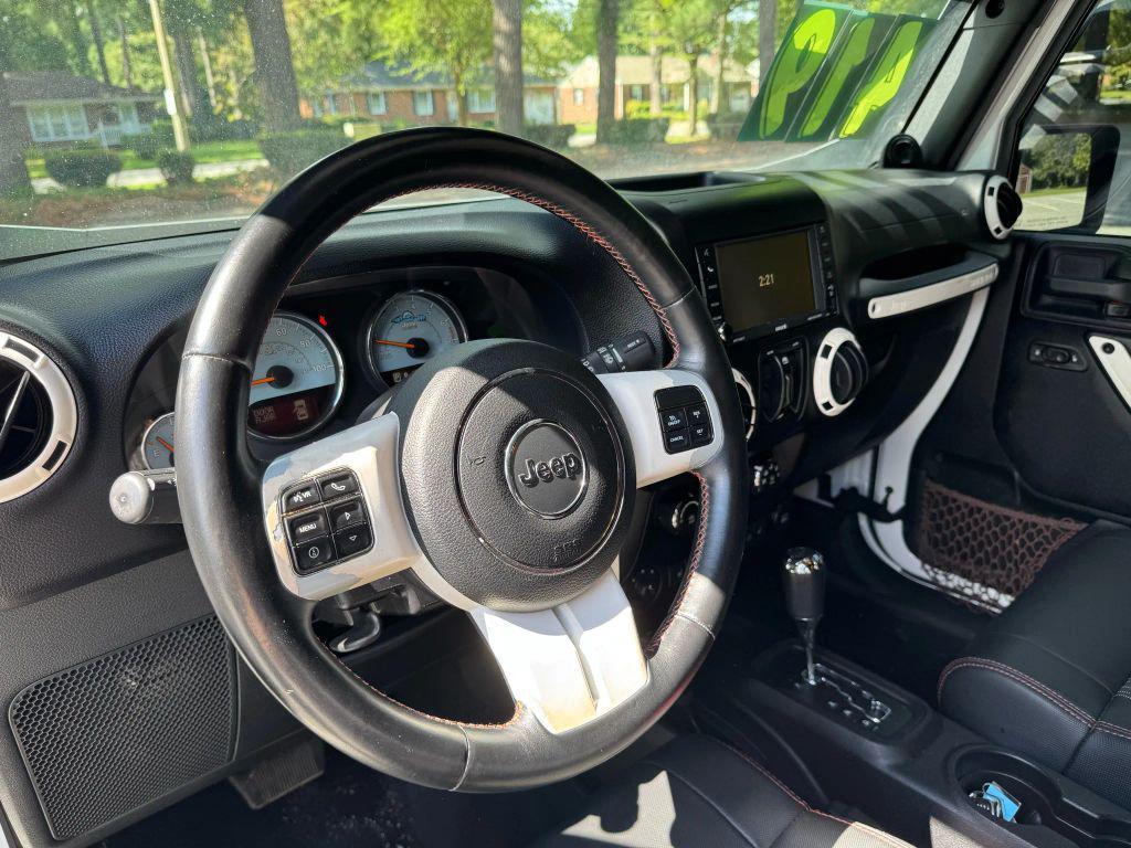 used 2012 Jeep Wrangler Unlimited car, priced at $15,600