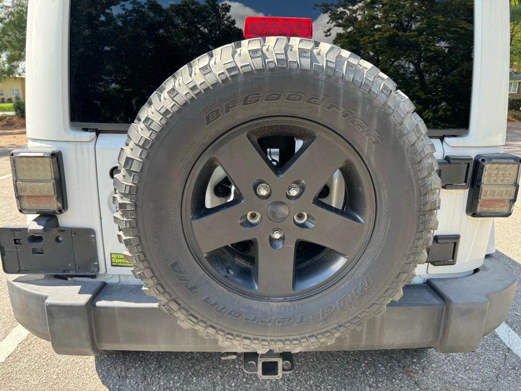 used 2012 Jeep Wrangler Unlimited car, priced at $15,600