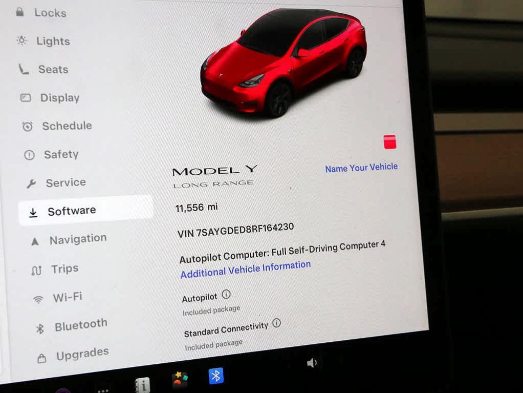 used 2024 Tesla Model Y car, priced at $33,599