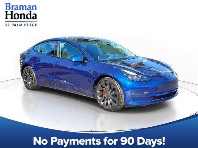 used 2023 Tesla Model 3 car, priced at $34,590