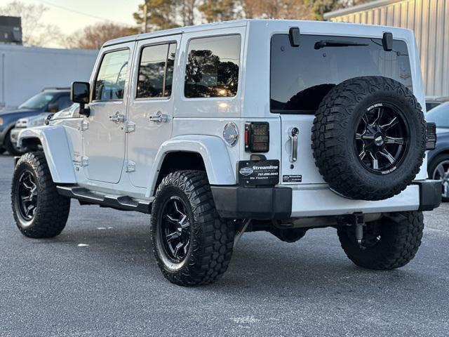 used 2013 Jeep Wrangler Unlimited car, priced at $18,999