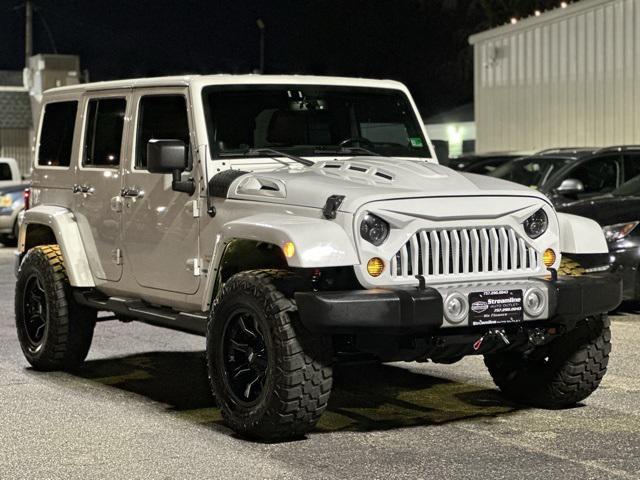 used 2013 Jeep Wrangler Unlimited car, priced at $18,999