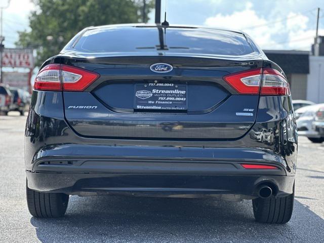 used 2014 Ford Fusion car, priced at $8,195