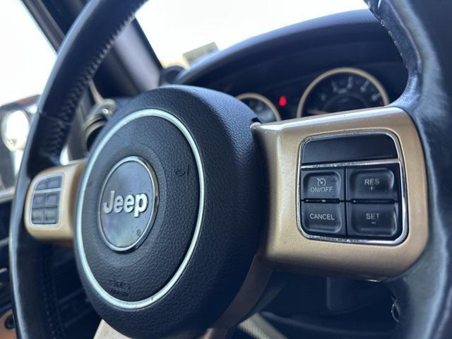 used 2014 Jeep Wrangler Unlimited car, priced at $12,795