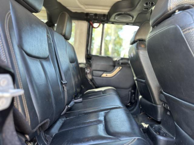 used 2014 Jeep Wrangler Unlimited car, priced at $12,795