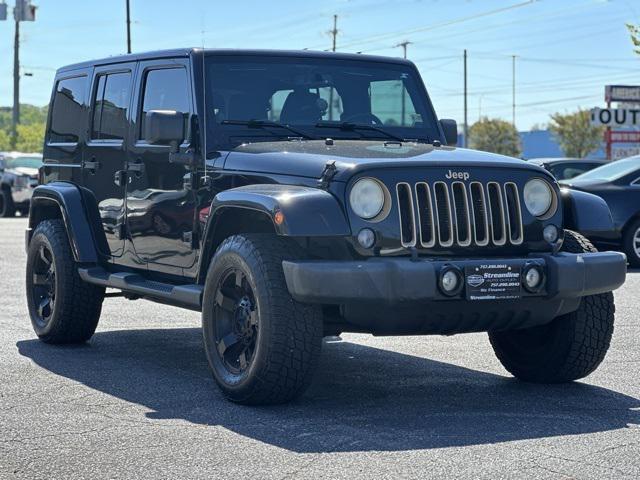 used 2014 Jeep Wrangler Unlimited car, priced at $12,795