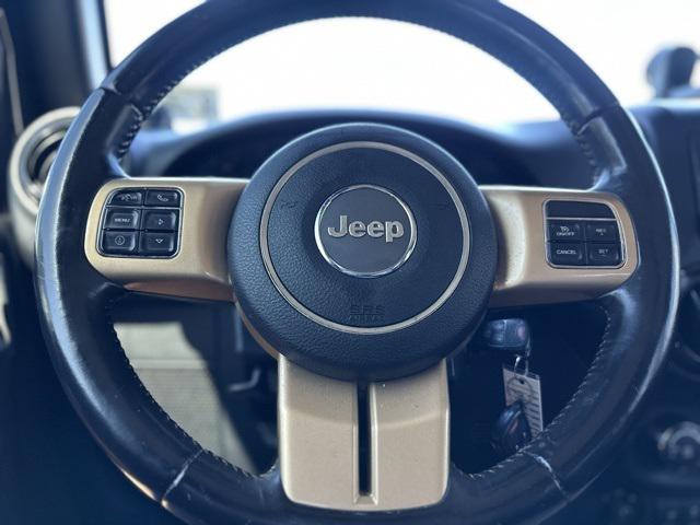 used 2014 Jeep Wrangler Unlimited car, priced at $12,795