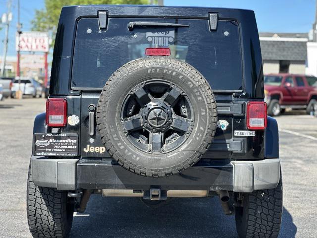 used 2014 Jeep Wrangler Unlimited car, priced at $12,795