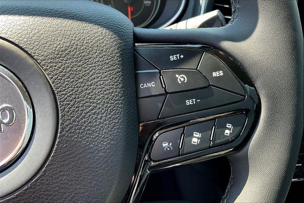 used 2023 Jeep Cherokee car, priced at $28,400