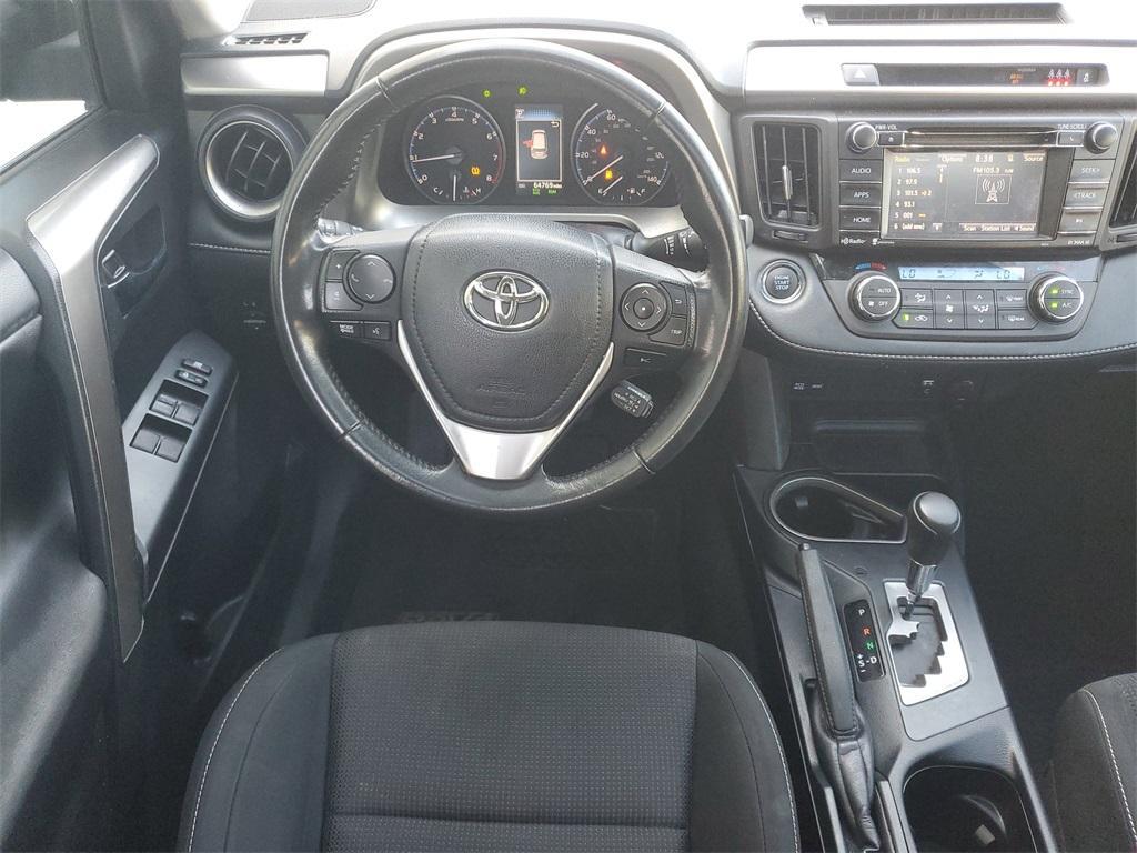 used 2018 Toyota RAV4 car, priced at $19,230