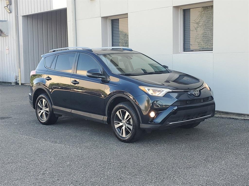 used 2018 Toyota RAV4 car, priced at $19,230