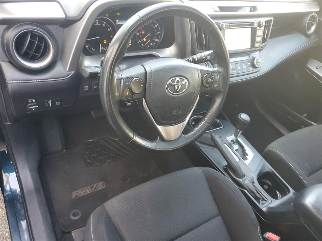 used 2018 Toyota RAV4 car, priced at $19,230