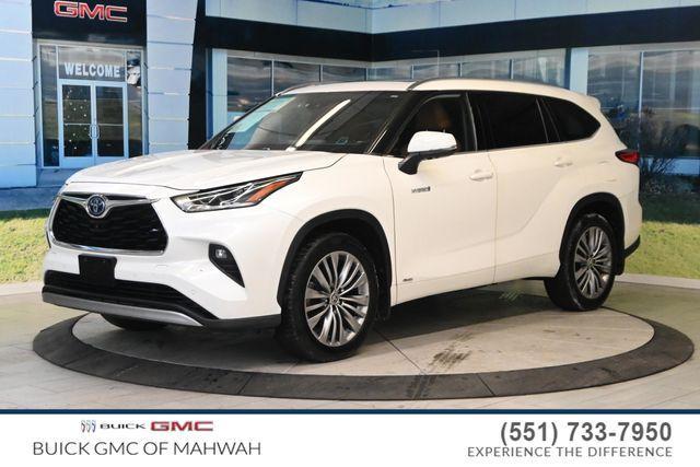 used 2021 Toyota Highlander Hybrid car, priced at $32,795