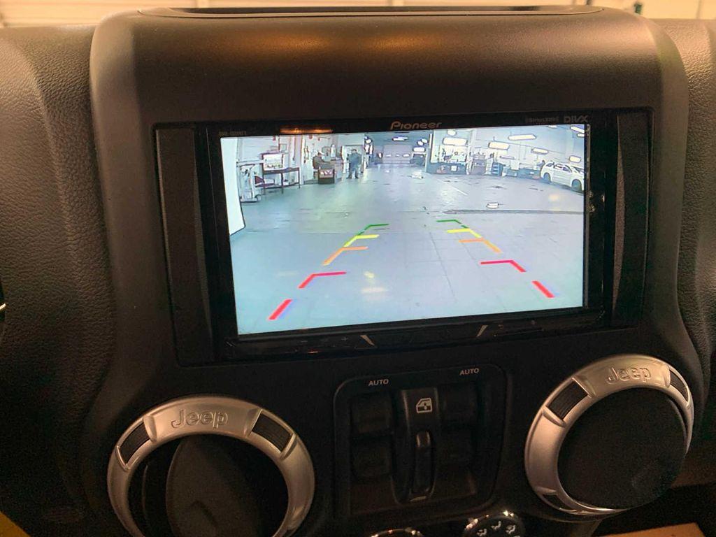 used 2014 Jeep Wrangler Unlimited car, priced at $19,489