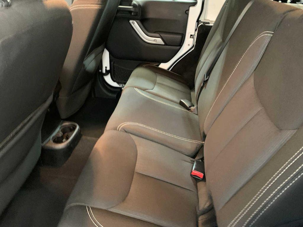 used 2014 Jeep Wrangler Unlimited car, priced at $19,489