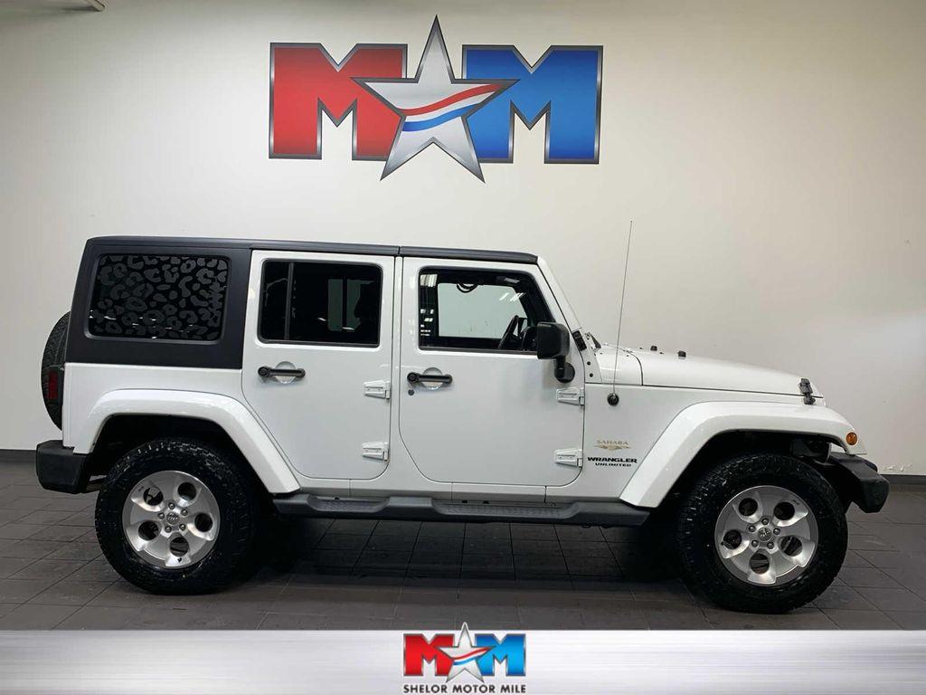 used 2014 Jeep Wrangler Unlimited car, priced at $19,489