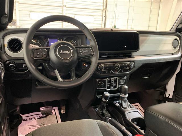 used 2024 Jeep Wrangler car, priced at $38,589