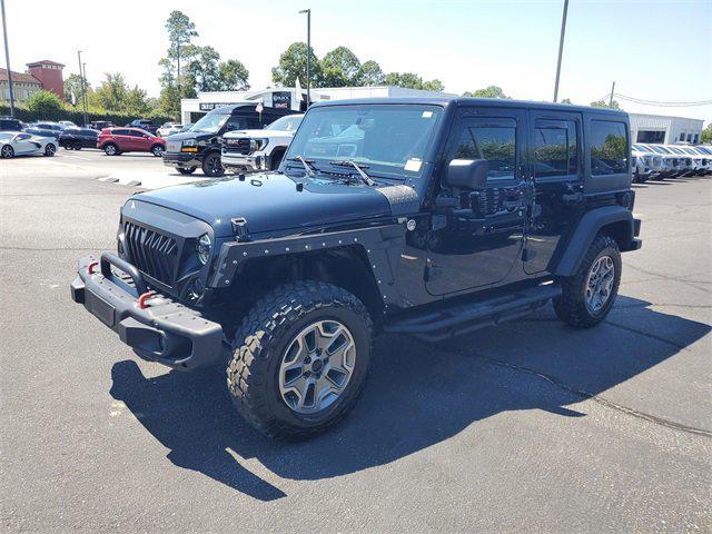 used 2015 Jeep Wrangler Unlimited car, priced at $23,990