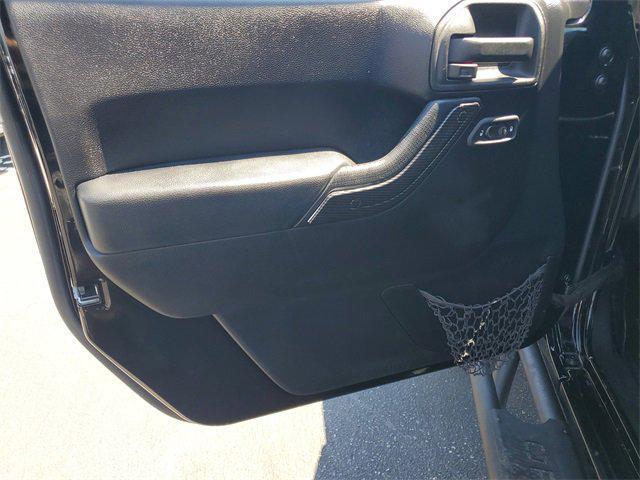 used 2015 Jeep Wrangler Unlimited car, priced at $23,990