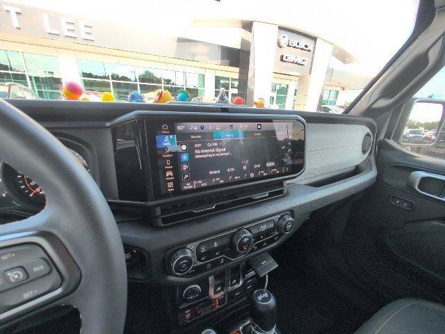used 2024 Jeep Wrangler car, priced at $38,990