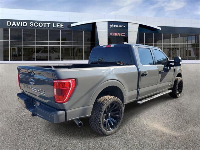 used 2021 Ford F-150 car, priced at $34,590