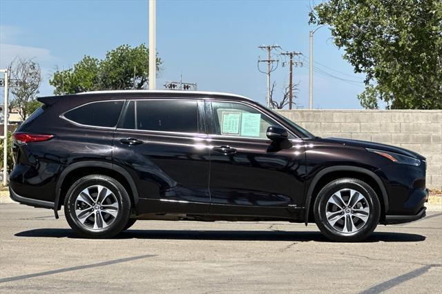 used 2022 Toyota Highlander Hybrid car, priced at $41,598