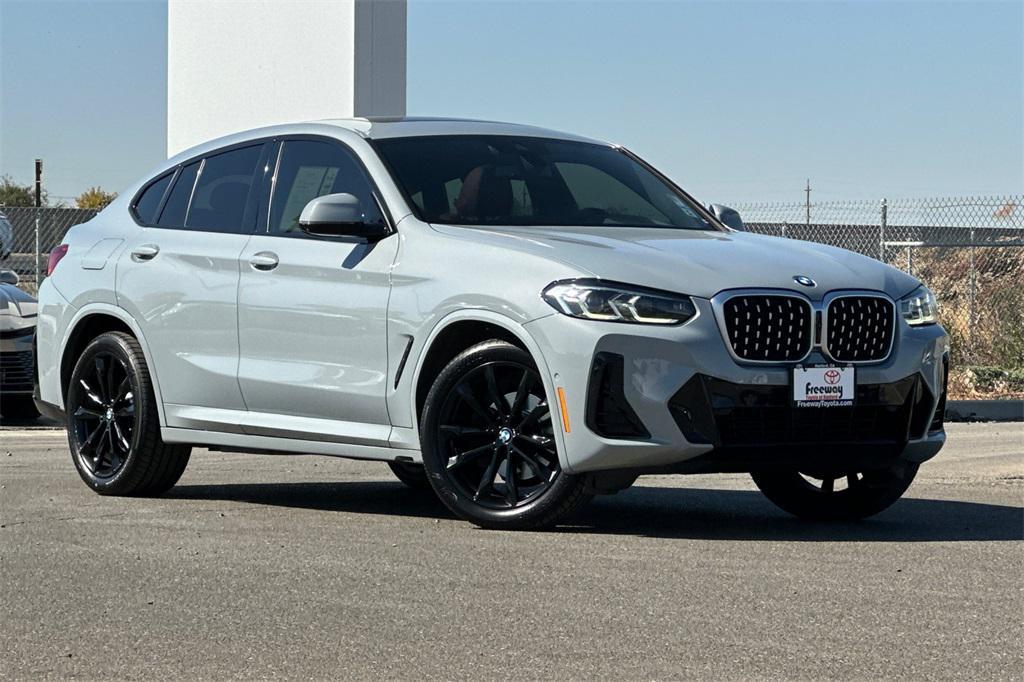 used 2023 BMW X4 car, priced at $29,390