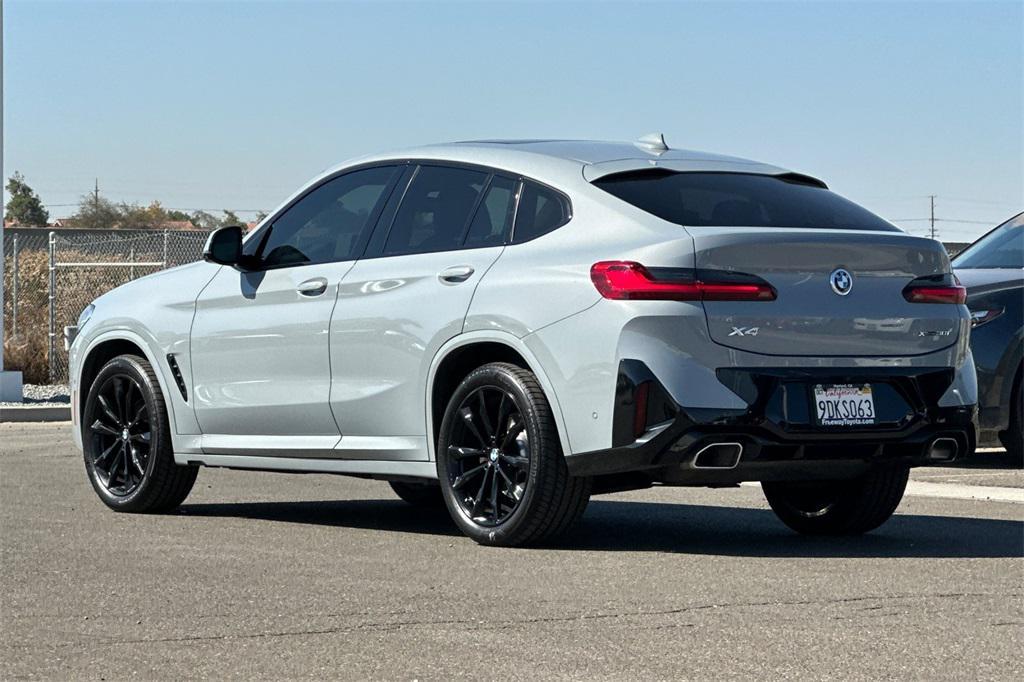 used 2023 BMW X4 car, priced at $29,390