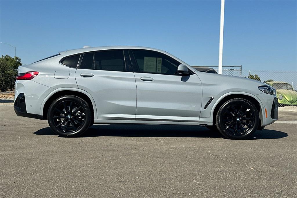 used 2023 BMW X4 car, priced at $29,390