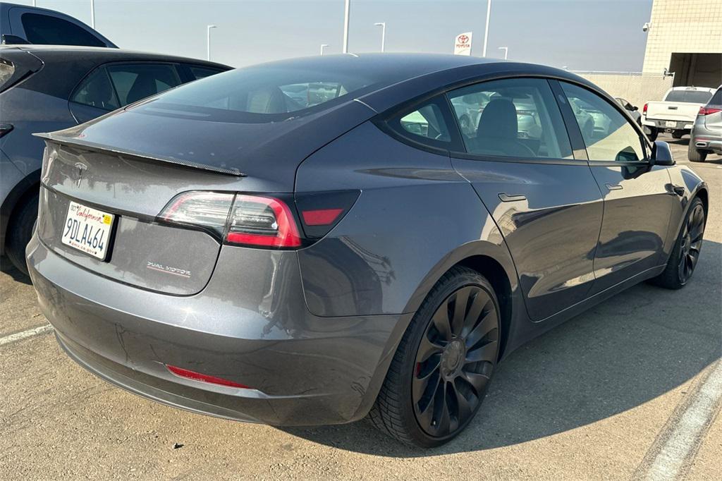 used 2023 Tesla Model 3 car, priced at $27,750