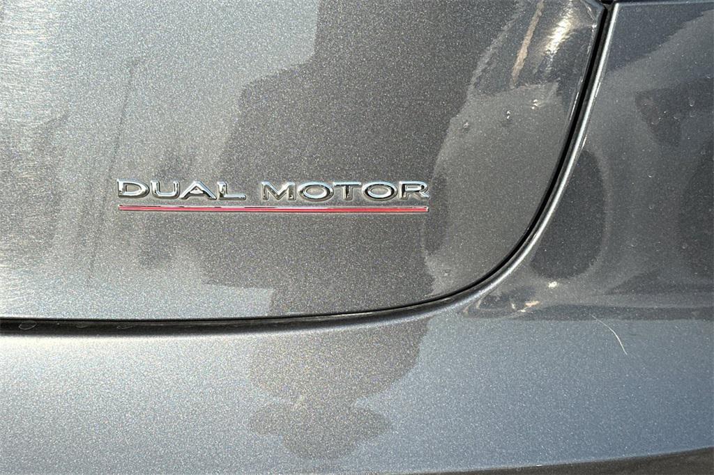 used 2023 Tesla Model 3 car, priced at $27,750