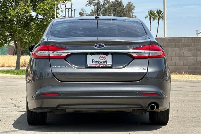 used 2018 Ford Fusion Hybrid car, priced at $10,894
