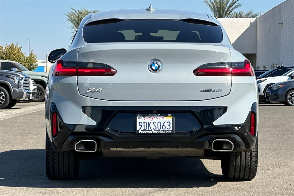 used 2023 BMW X4 car, priced at $30,998