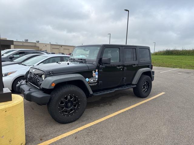 used 2014 Jeep Wrangler Unlimited car, priced at $14,899