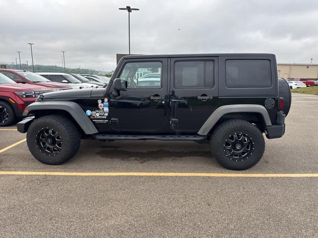 used 2014 Jeep Wrangler Unlimited car, priced at $14,899