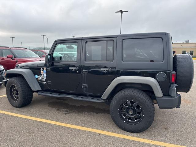 used 2014 Jeep Wrangler Unlimited car, priced at $14,899